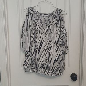 Jennifer Lopez peek a boo shoulder blouse